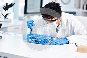 Scientist, lab or test tube with safety and development, pharmaceutical or biotechnology. Male person, research or