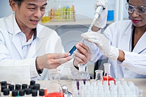Scientist  in laboratory with holding a test tube. Medical healthcare technology and pharmaceutical research and development