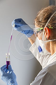 Scientist laboratory pipette l