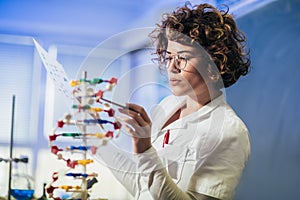 Scientist looking at DNA in laboratory