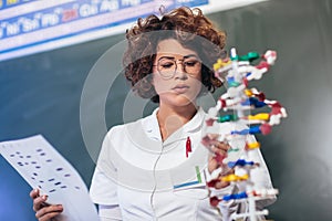 Scientist looking at DNA in lab