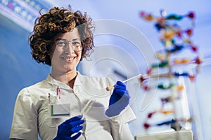 Scientist looking at DNA in laboratory