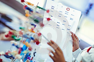 Scientist looking at DNA in laboratory