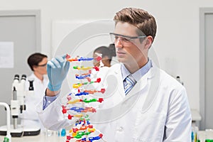 Scientist making DNA helix