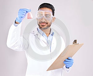 Scientist man, beaker and thinking with checklist, analysis and ppe goggles in studio by white background. Asian science