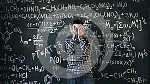 Scientist man disappointed about problems experiment in chemical and mathematical equations room