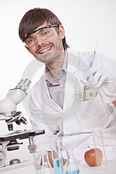 Scientist manipulating doping substances photo