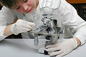 Scientist and microscope