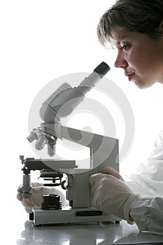 Scientist and microscope