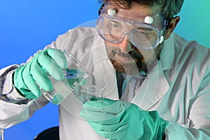 Scientist Mixing Chemicals in Laboratory