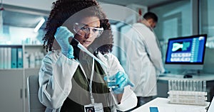 Scientist, pipette and woman with beaker for chemistry, research or experiment at laboratory. Science, glass and serious
