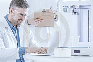 Scientist preseting the printer
