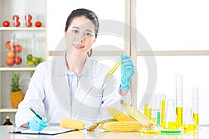 Scientist Recording genetic modification data from examining