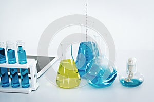 Scientist research laboratory equipment tools in Lab room secure., Testing beakers and tube on a tabletop., Technology of