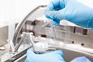 Scientist showing a dewaxed tissue samples in the laboratory. Xylene-based removal of paraffin photo