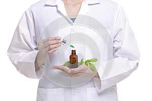 Scientist study and research liquid medicine from natural herbal
