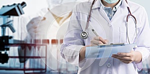 Scientist Taking notes in the laboratory,Laboratory research concept,science background