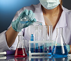 Scientist with test tubes