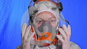 Scientist virologist in respirator. Woman close up look, wearing protective medical mask. Concept health safety N1H1