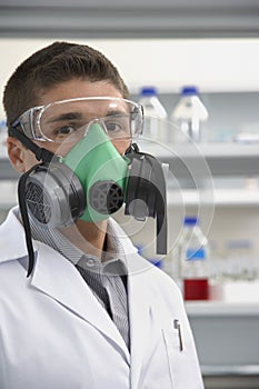 Scientist Wearing Gas Mask In Laboratory