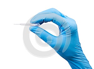 Scientist wears blue rubber gloves hands holding transparent plastic laboratory pipette or dropper isolate on white background