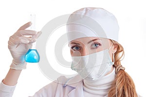 Scientist woman with chemical glassware