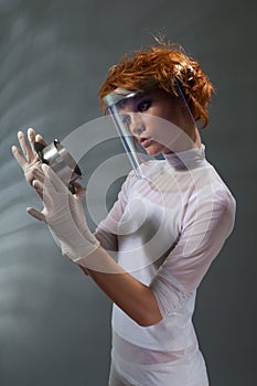 Scientist woman examine metal part concept