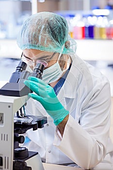 Scientist at work in a chemical laboratory.