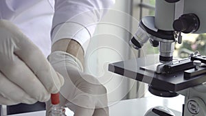 Scientist work with science equipment in laboratory. Scientific research concept