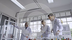 Scientist work with science equipment in laboratory. Scientific research concept.