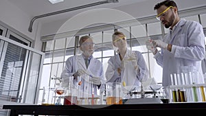 Scientist work with science equipment in laboratory. Scientific research concept.