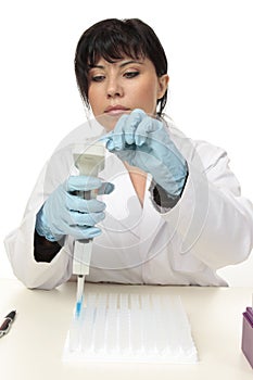 Scientist working with pipette