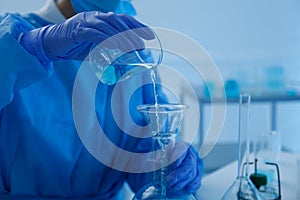 Scientist working with sample in laboratory, closeup. Medical research