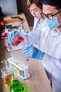 Doctor and Scientist in lap test photo