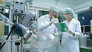 Scientists and assistants are in the machine room extracting oil