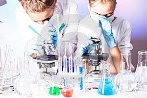 scientists in the chemical laboratory