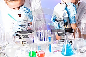scientists in the chemical laboratory