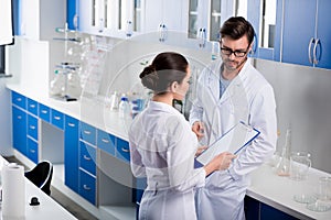 Scientists at chemical laboratory