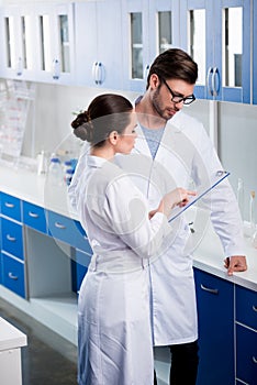 Scientists at chemical laboratory