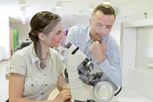 scientists at chemical laboratory during work