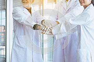 Scientists coordinate hand,Group of people teamwork in laboratory,Successful and reserch working photo