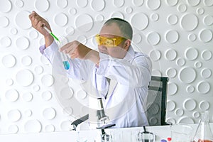 Scientists experiment in laboratory science.