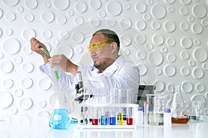 Scientists experiment in laboratory science.