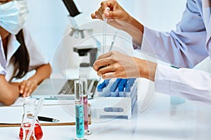 Scientists experimenting in laboratory