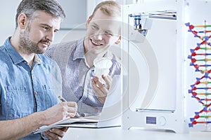 Scientists testing 3d printer