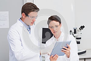 Scientists using tablet