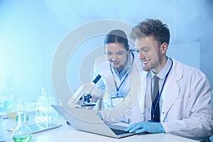 Scientists working in laboratory. Chemistry concept