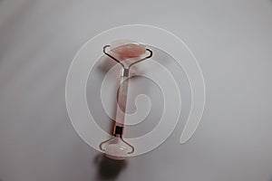 Scincare, beauty and health concept. Massage roller on a table