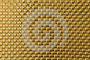 Scintillation pattern of golden woven metal bars