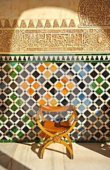 Scissors chair, Alhambra palace in Granada, Spain photo